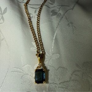 Dainty necklace with blue gem